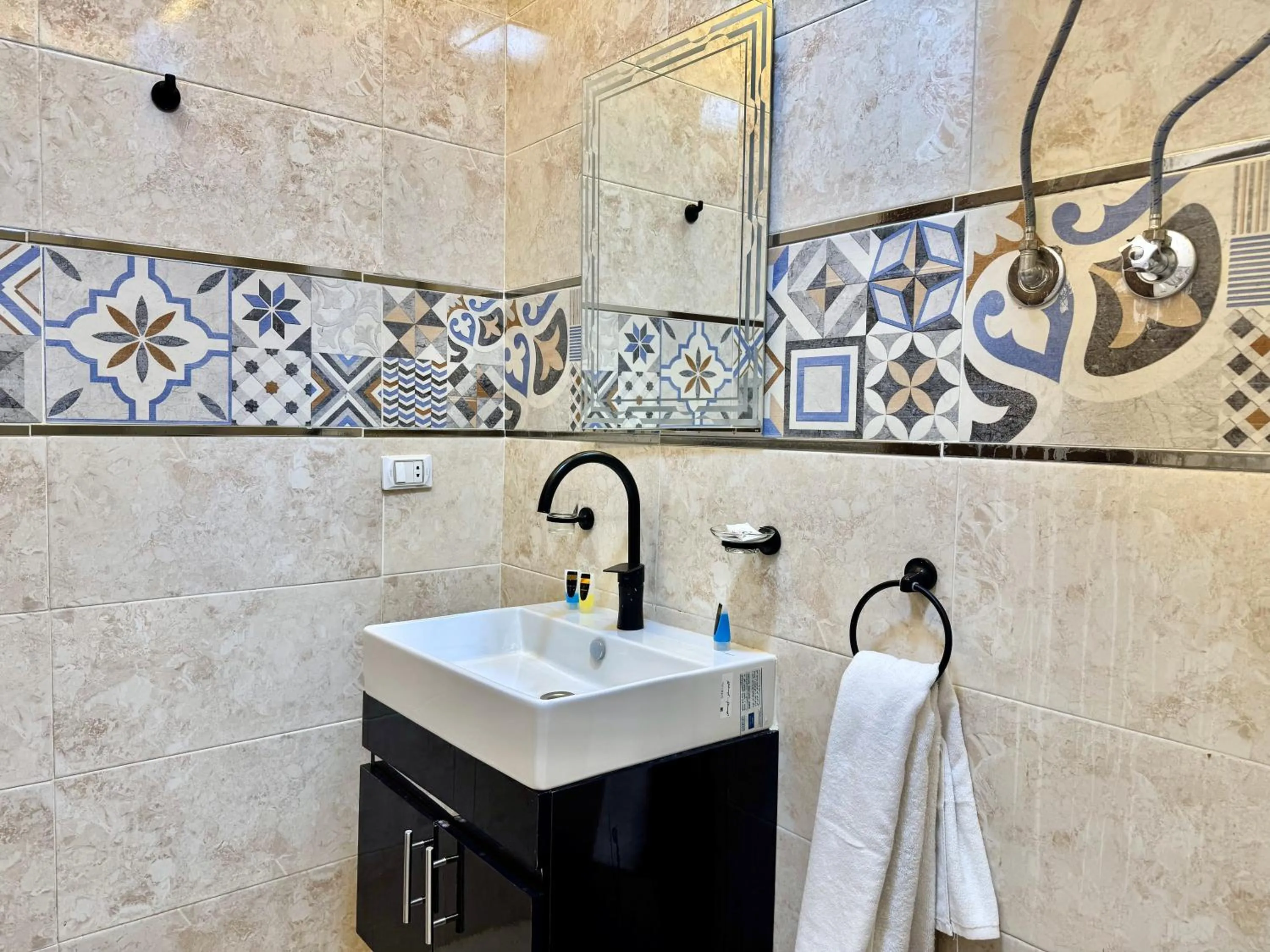 Shower in Night Pyramids Inn Hotel