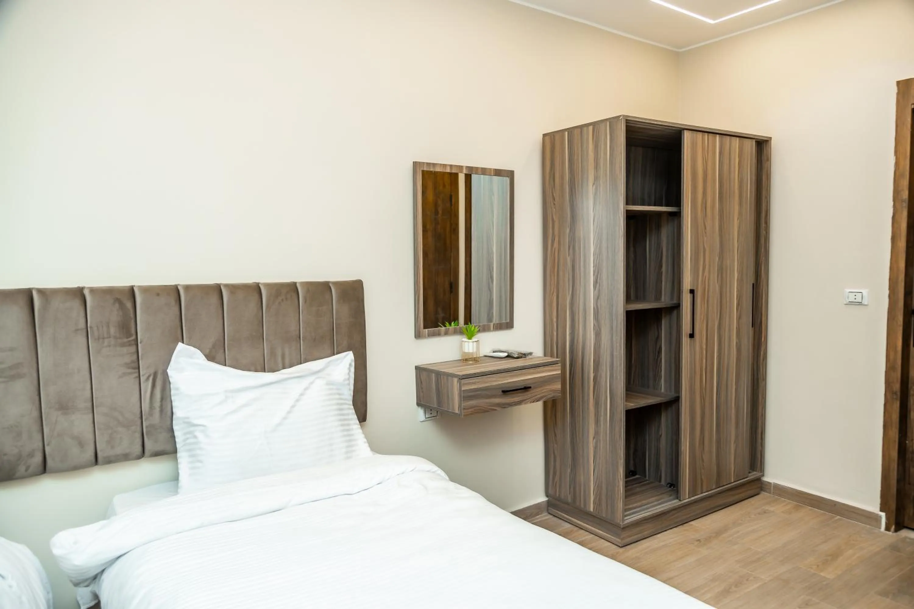 Bed in Night Pyramids Inn Hotel