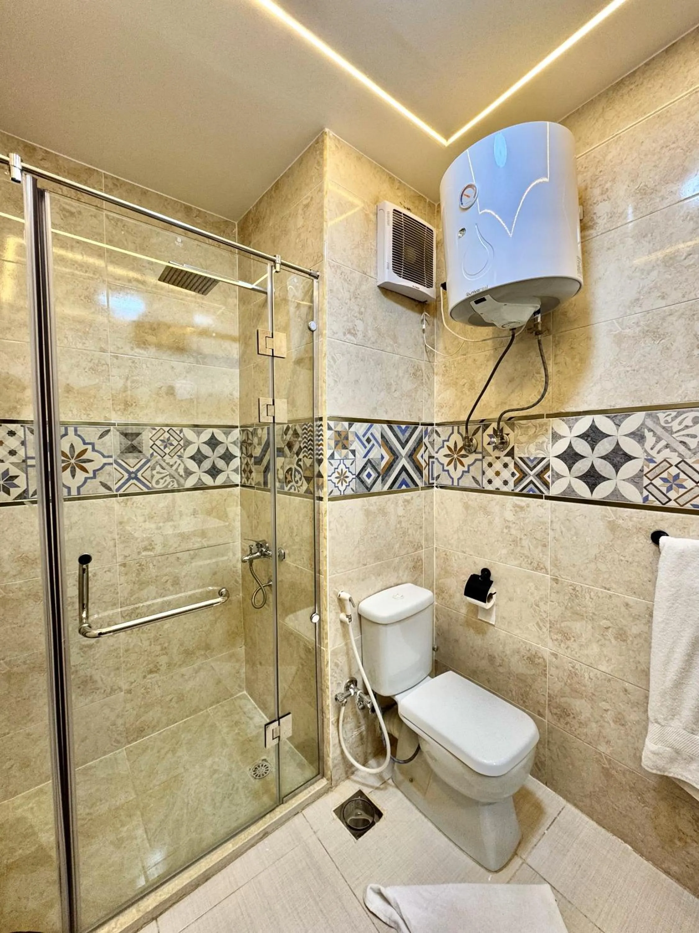 Shower in Night Pyramids Inn Hotel