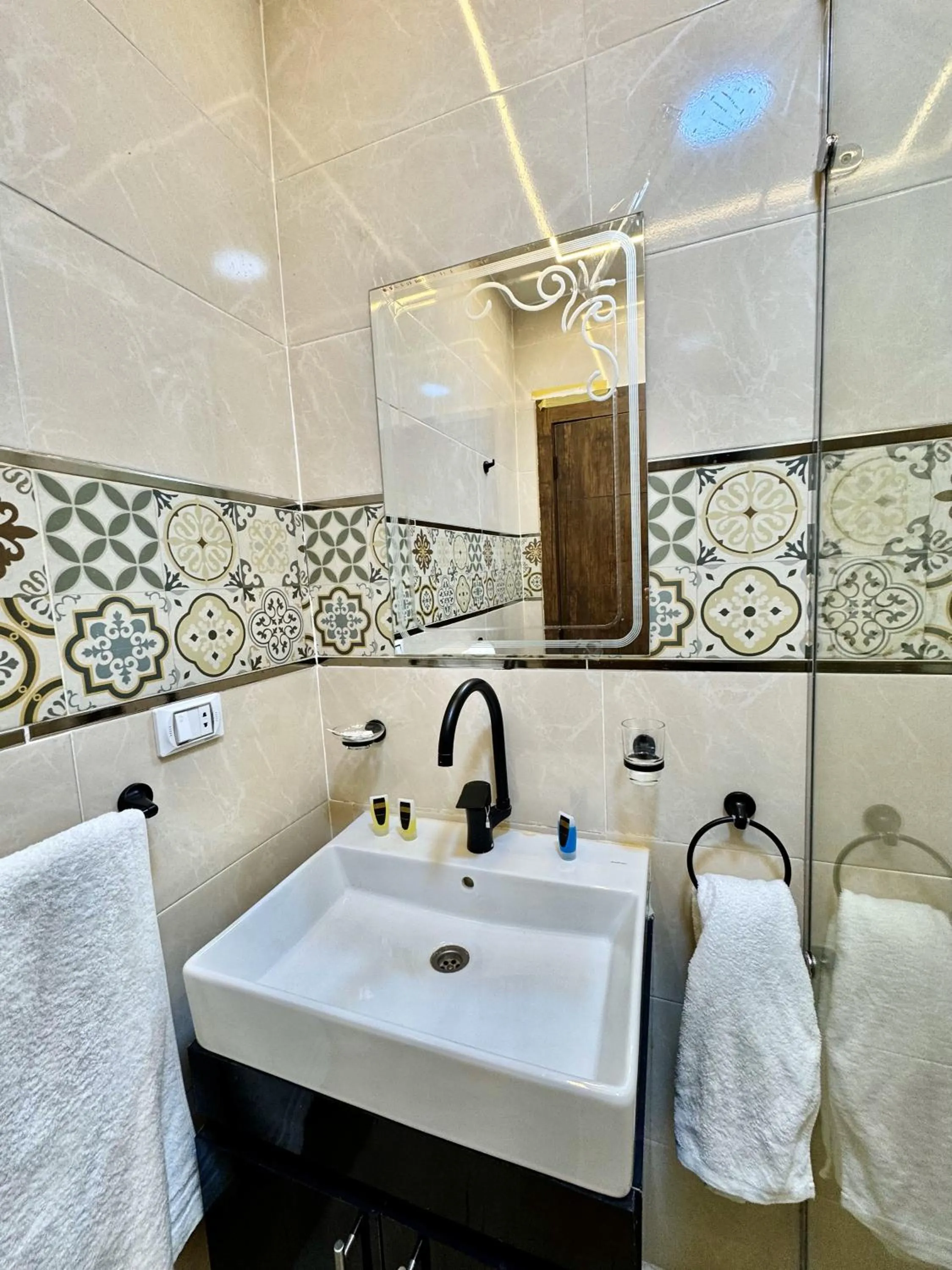 Shower in Night Pyramids Inn Hotel