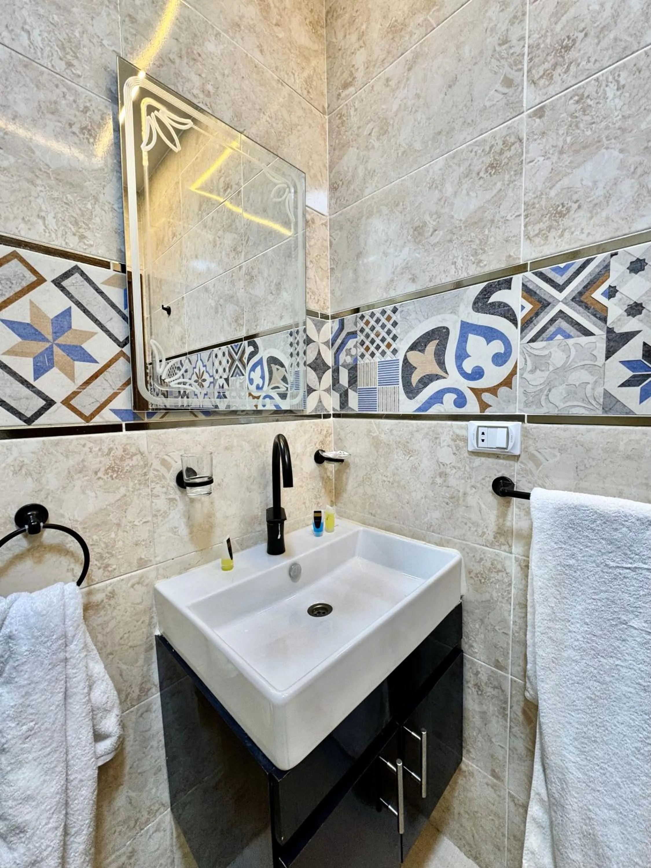 Shower in Night Pyramids Inn Hotel