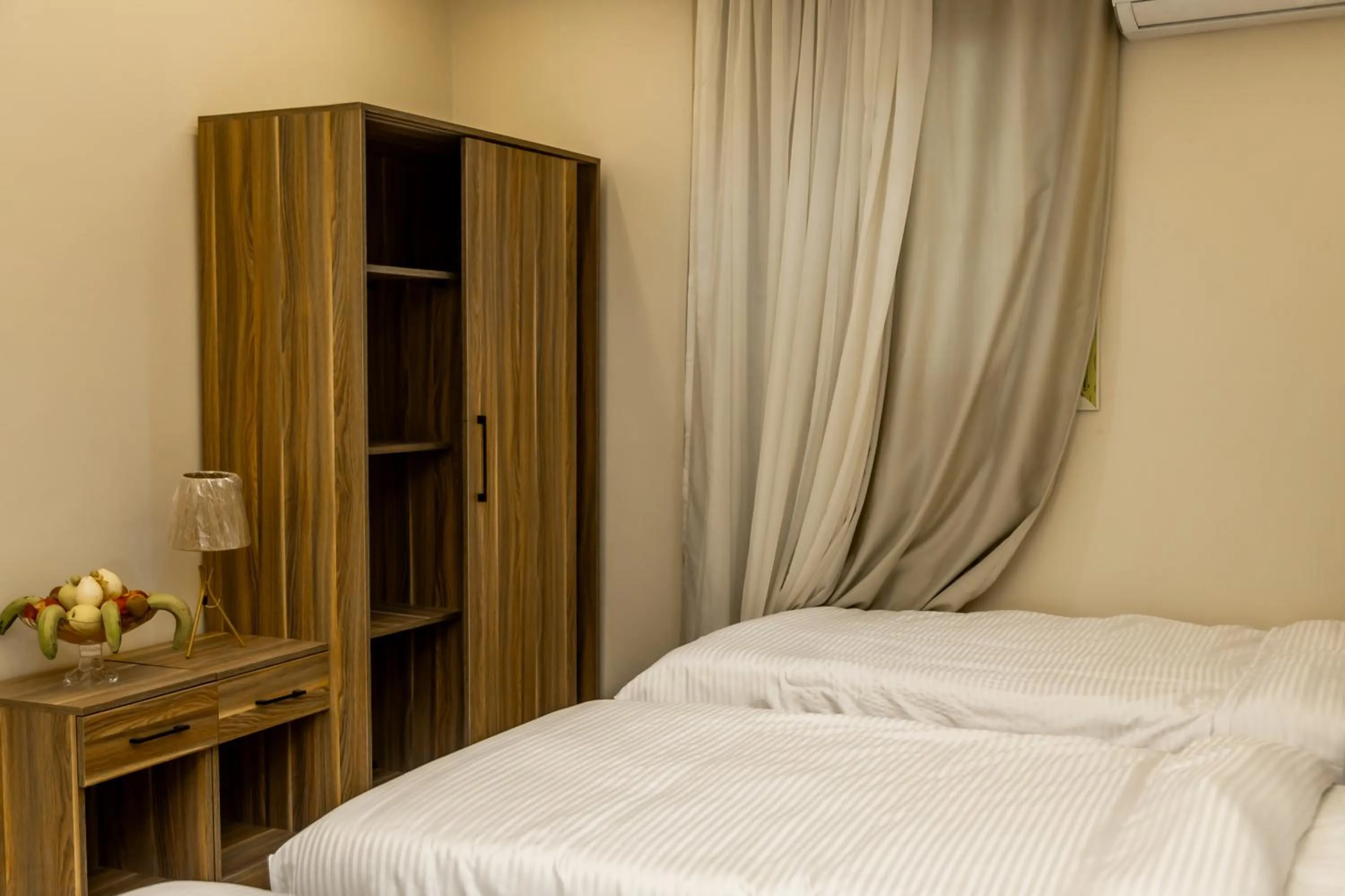 Bed in Night Pyramids Inn Hotel