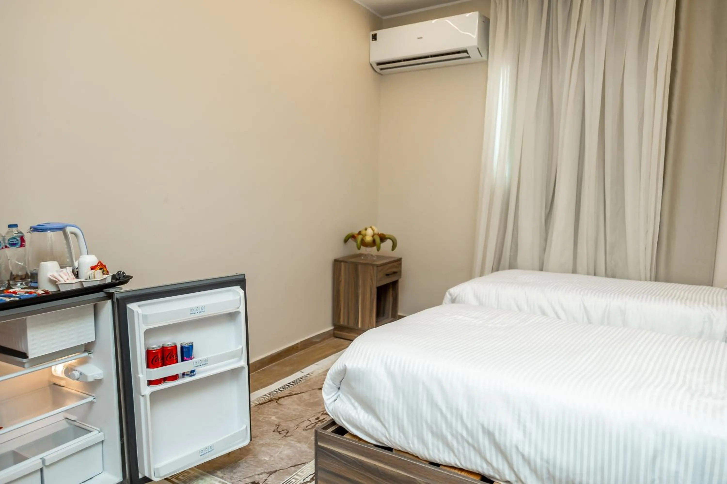 Bed in Night Pyramids Inn Hotel