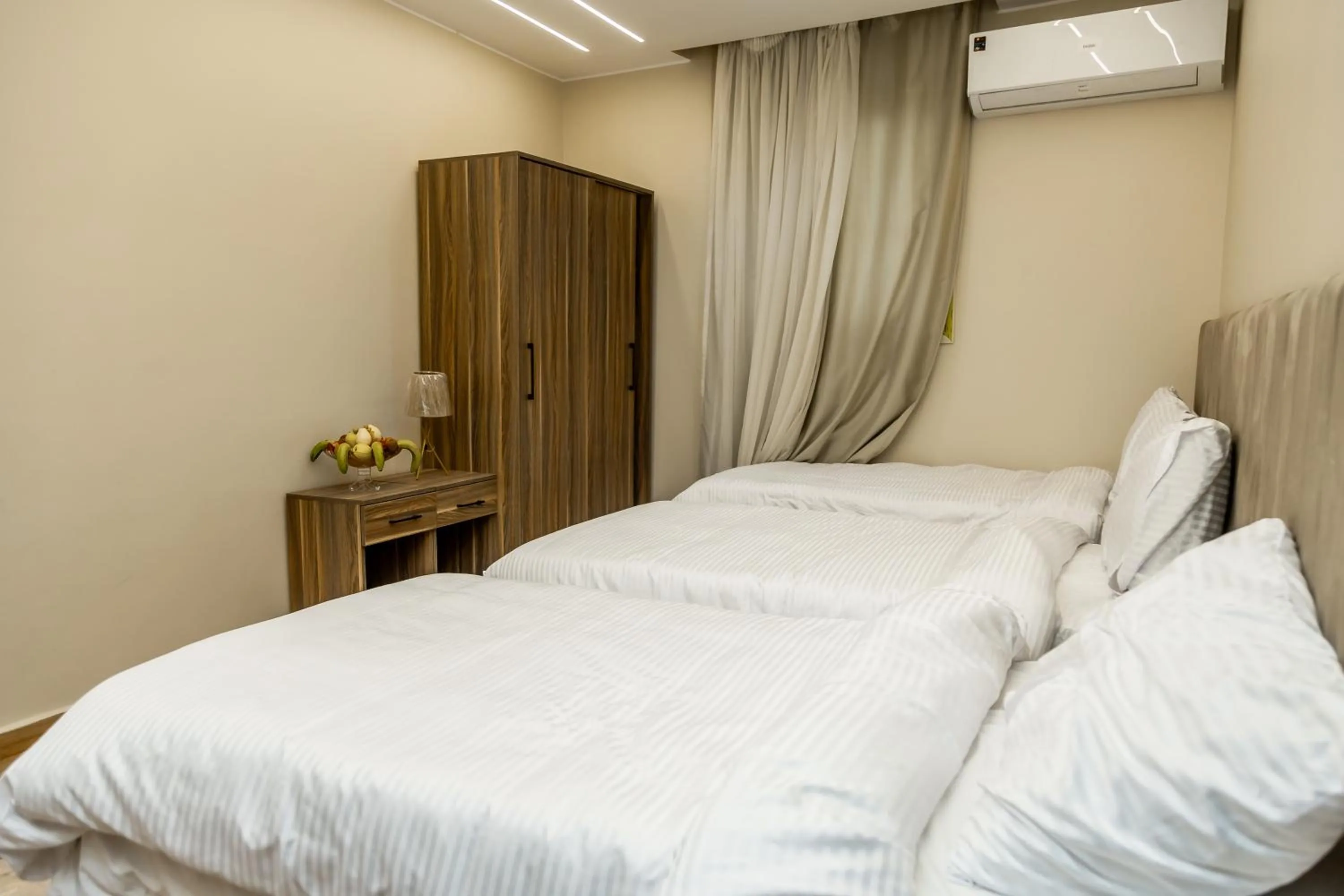 Bed in Night Pyramids Inn Hotel