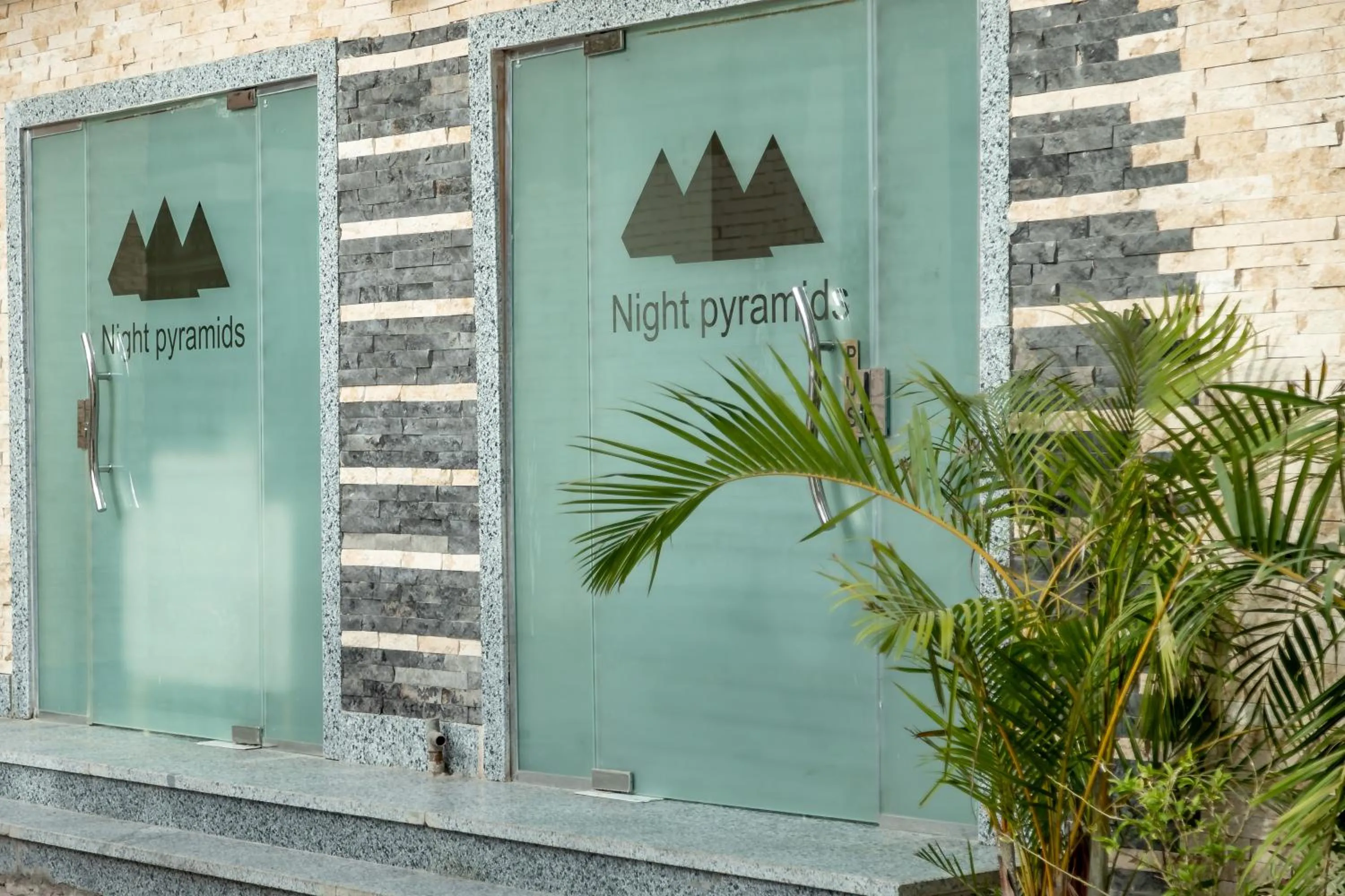 Day in Night Pyramids Inn Hotel