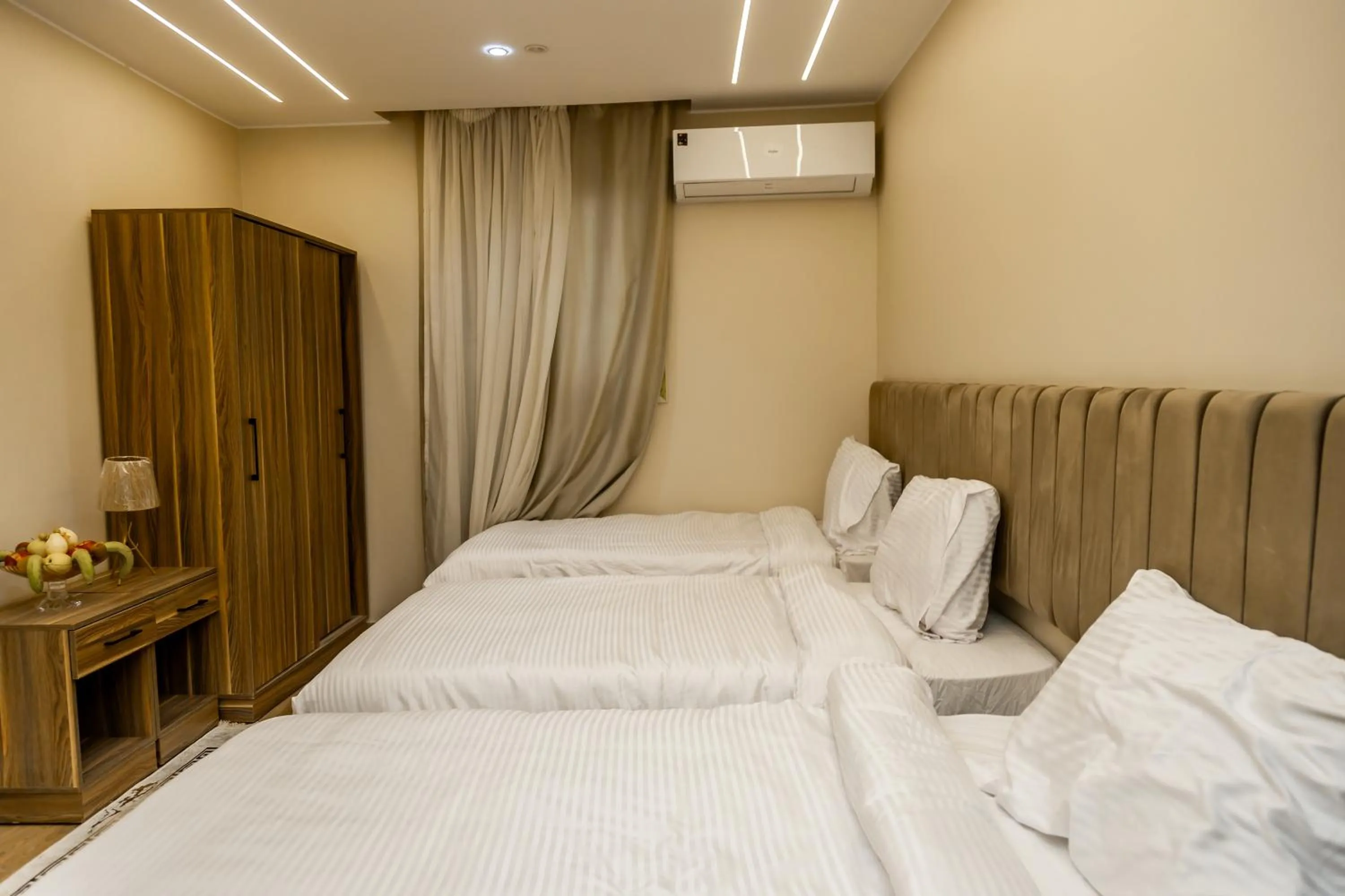 Bed in Night Pyramids Inn Hotel