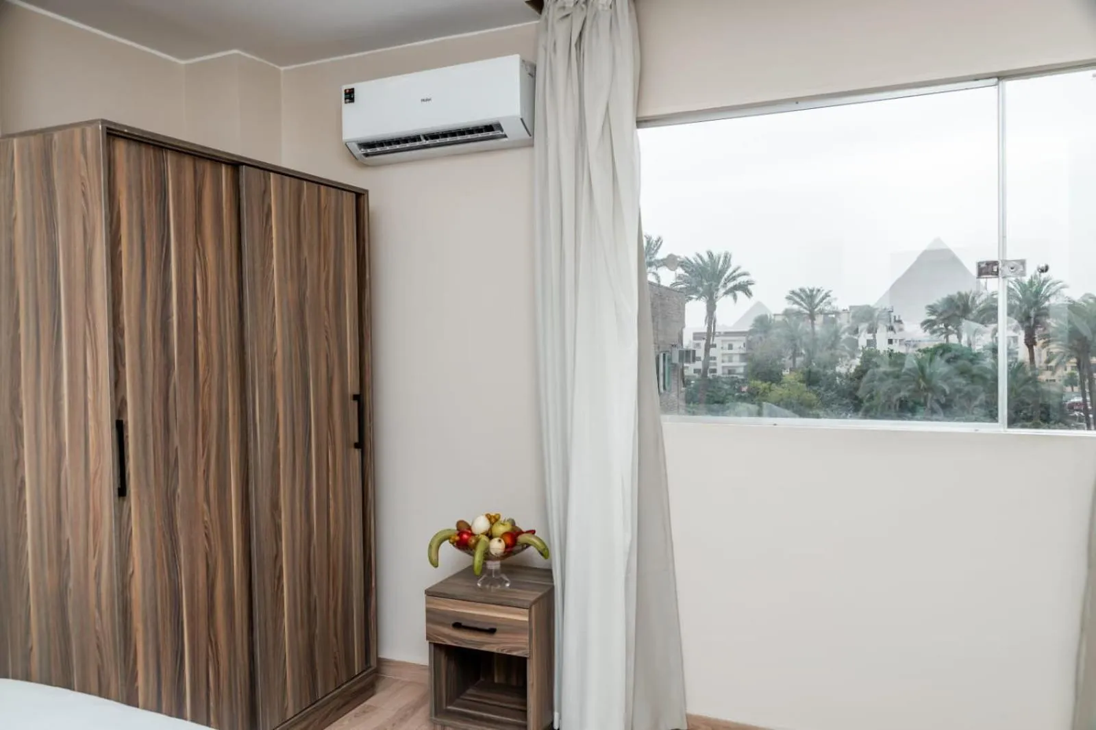 View (from property/room), Bed in Night Pyramids Inn Hotel