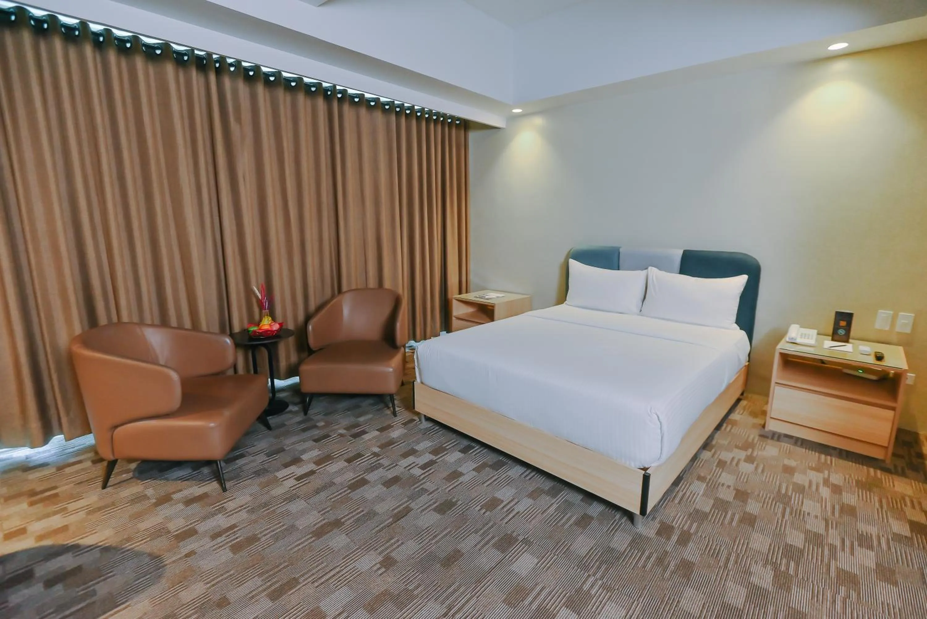 Bed in The Tribute Hotel