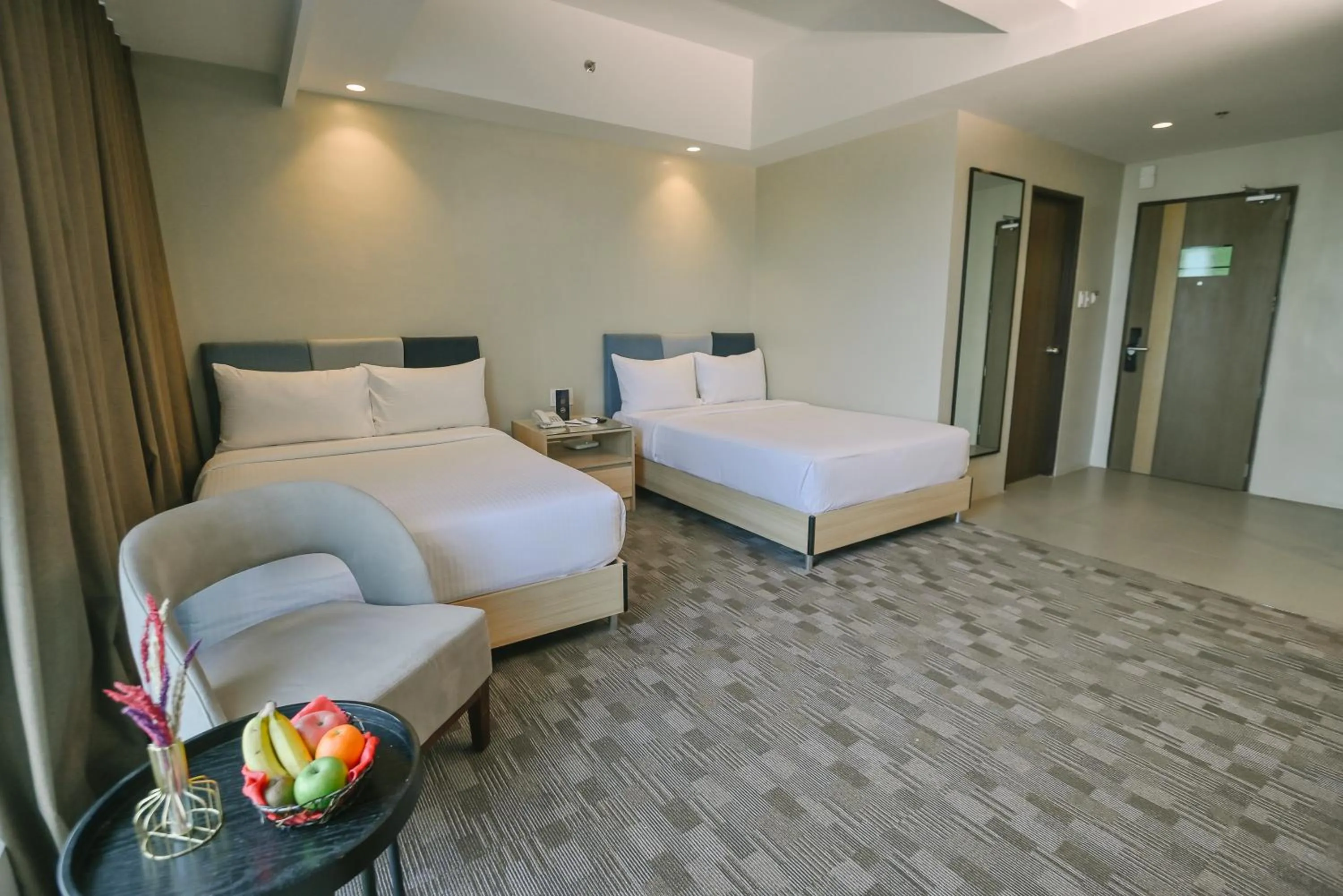 Bed in The Tribute Hotel