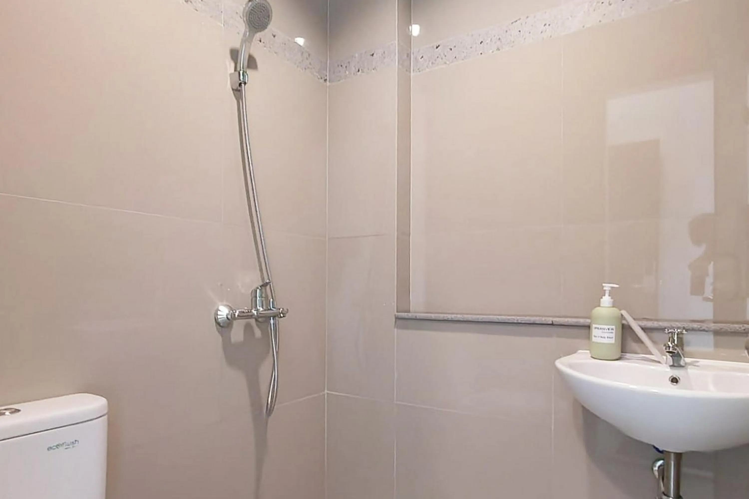 Bathroom in Urbanview Greenville Jakarta