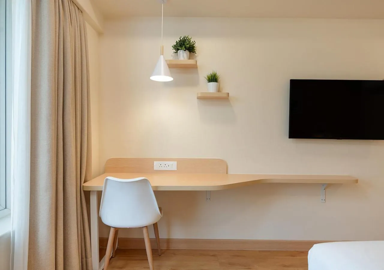 Bedroom in Bloom Hotel - SG Highway