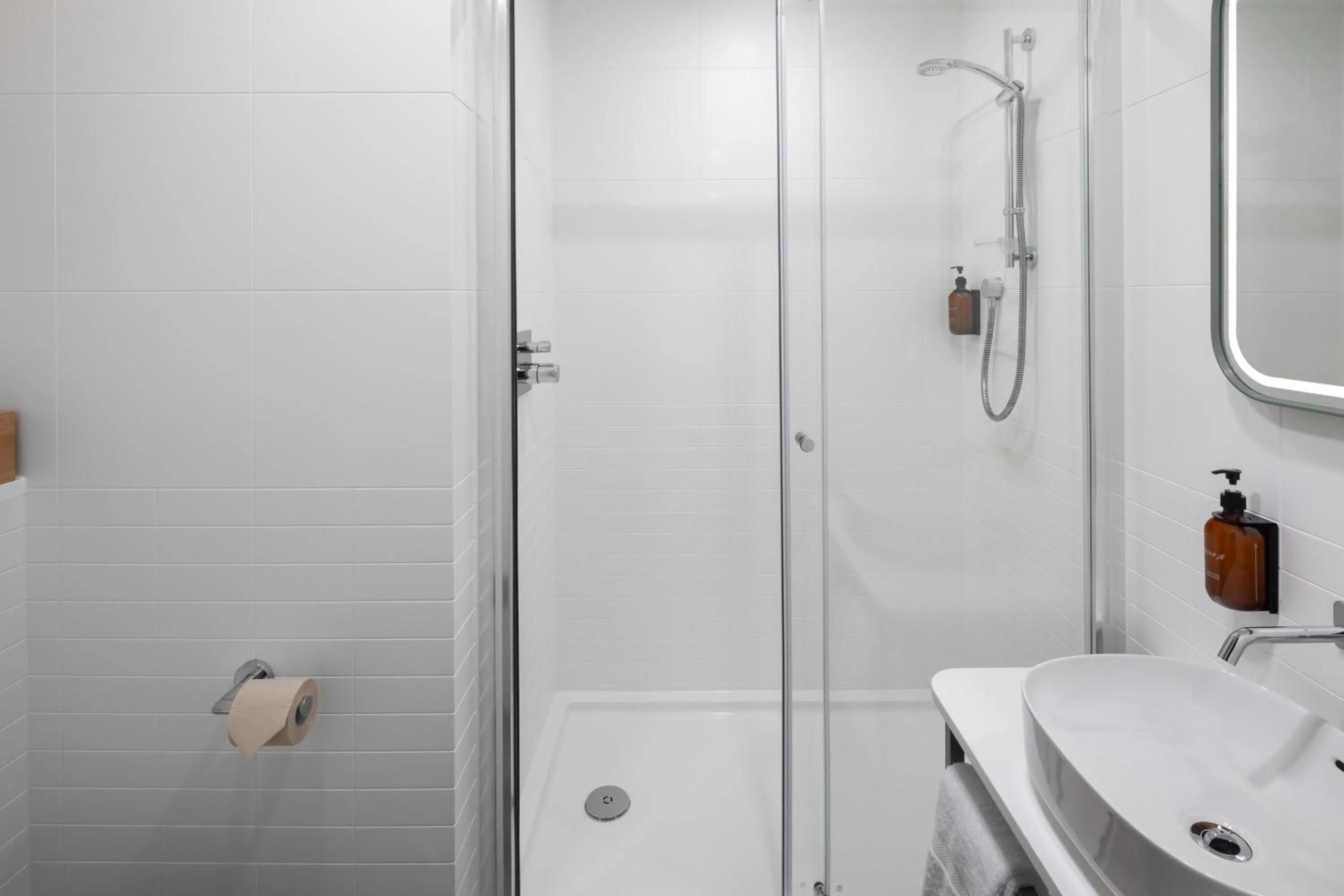 Bathroom in voco Zeal Exeter Science Park, by IHG