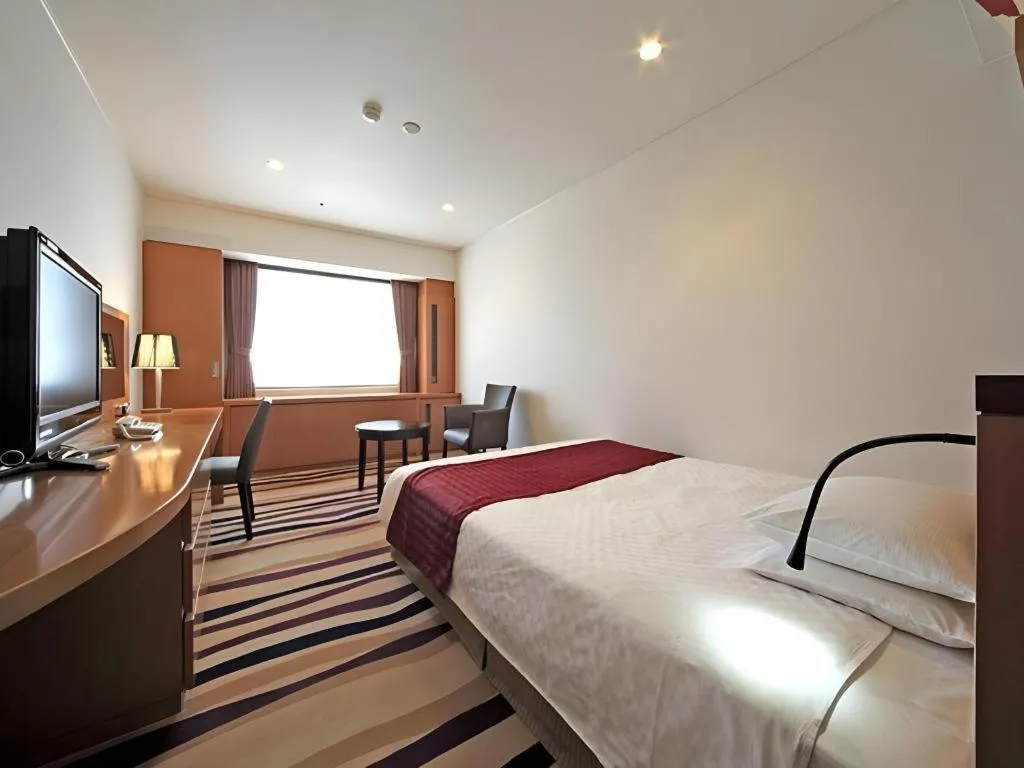 Bed in Gifu Grand Hotel