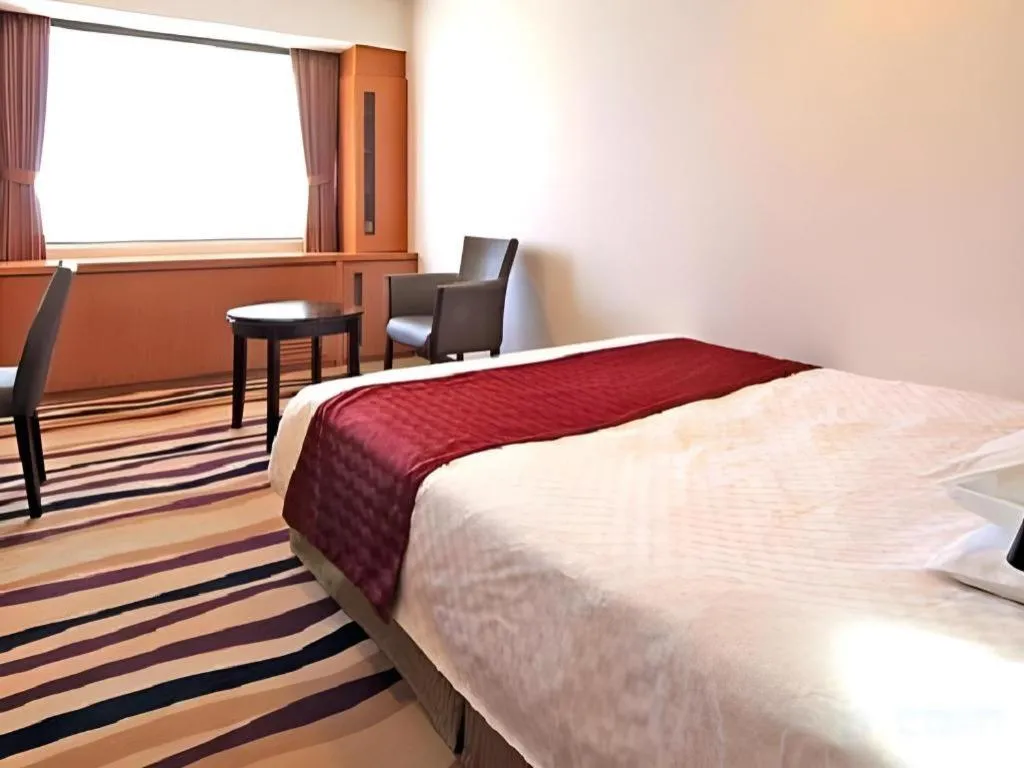 Bed in Gifu Grand Hotel