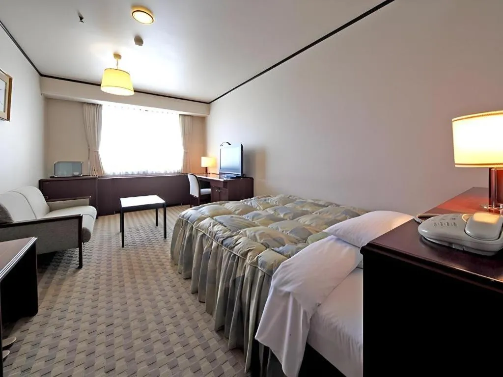 Bed in Gifu Grand Hotel