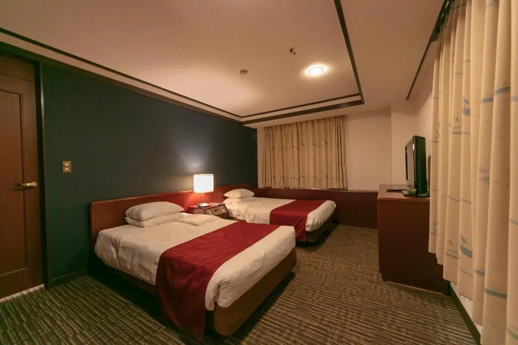 Bed in Gifu Grand Hotel