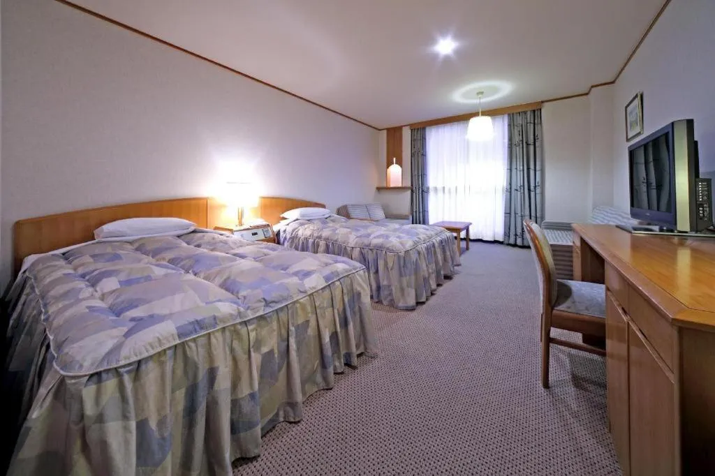 Bed in Gifu Grand Hotel