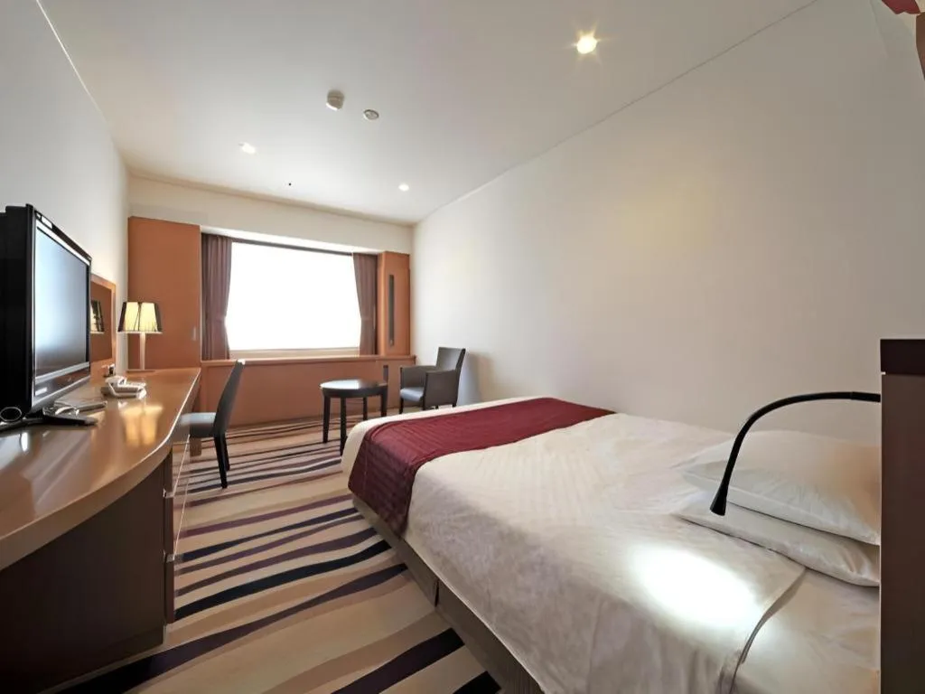 Bed in Gifu Grand Hotel