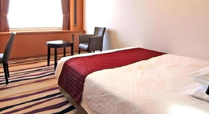 Bed in Gifu Grand Hotel