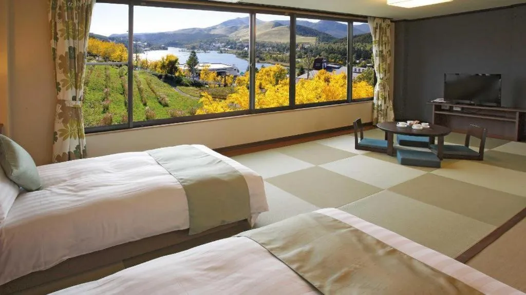 Bed in Ikenotaira Hotel