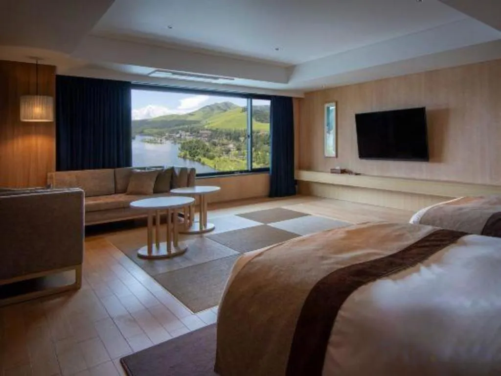 Bed in Ikenotaira Hotel