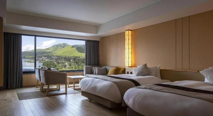 Bed in Ikenotaira Hotel