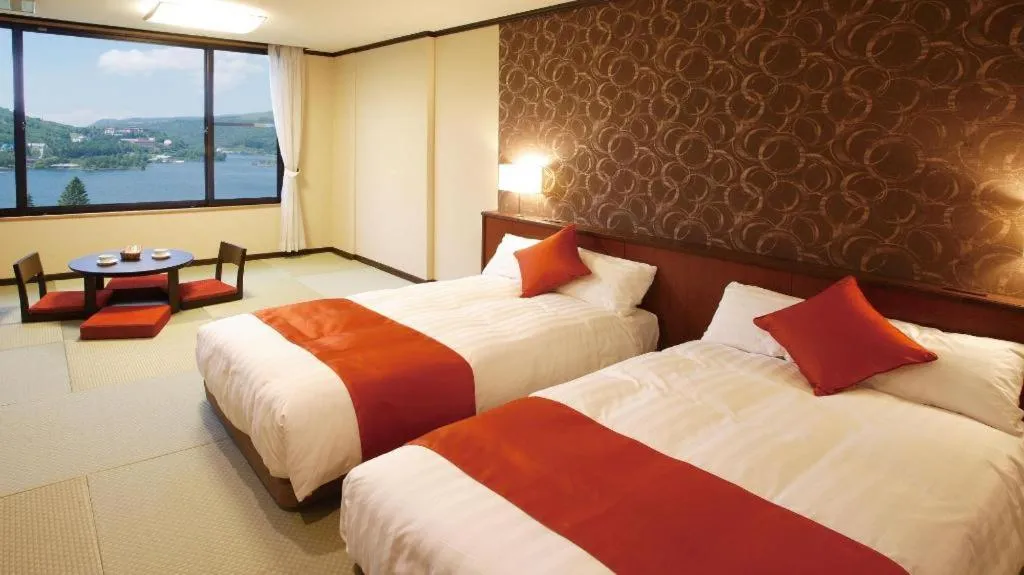 Bed in Ikenotaira Hotel