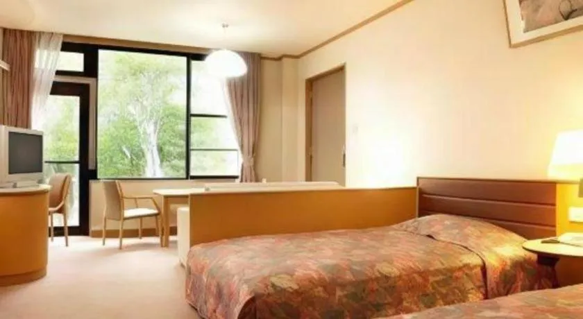 Bed in Ikenotaira Hotel
