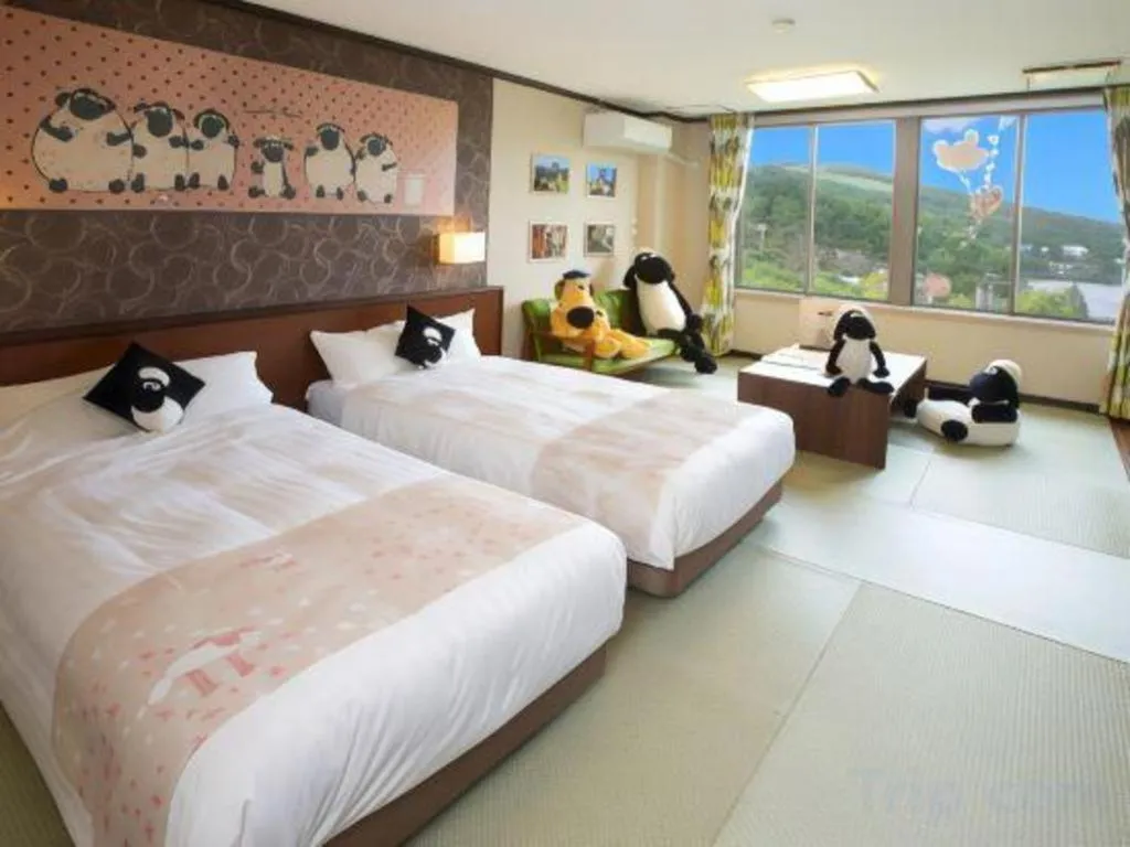 Bed in Ikenotaira Hotel