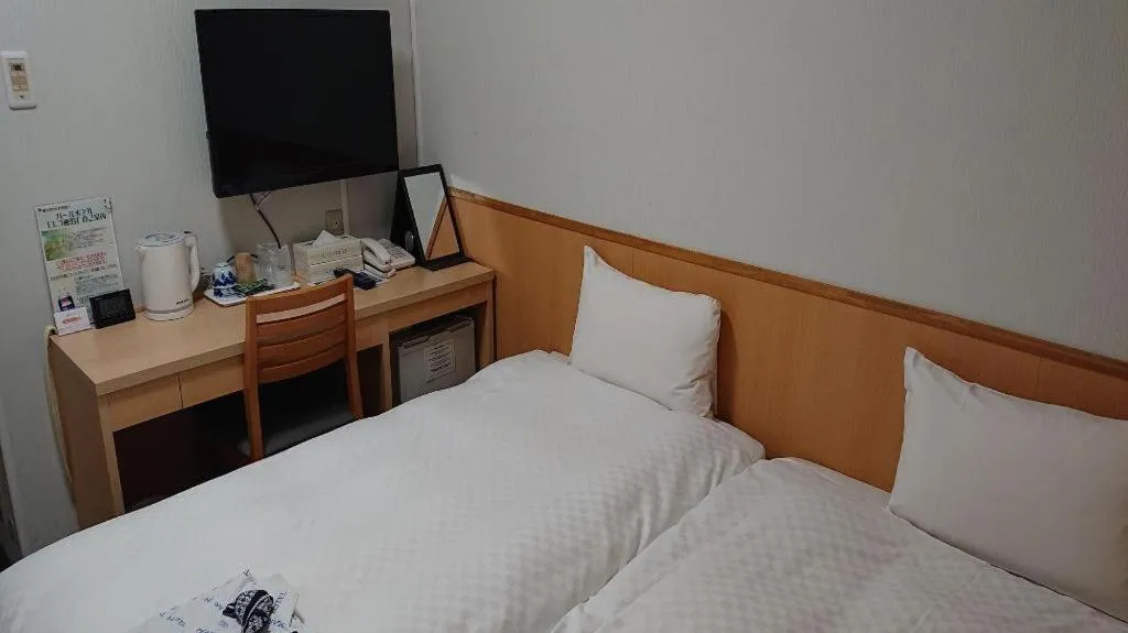 Bed in Pearl Hotel Ota