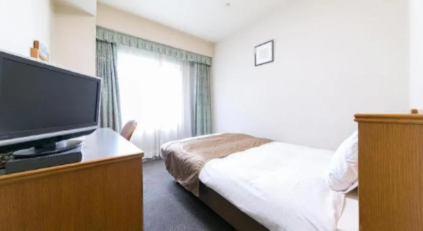 Bed in Pearl Hotel Ota