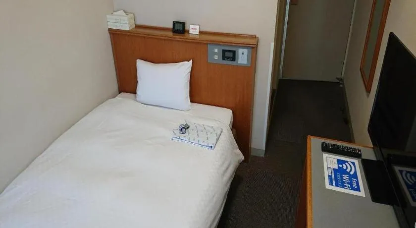 Bed in Pearl Hotel Ota