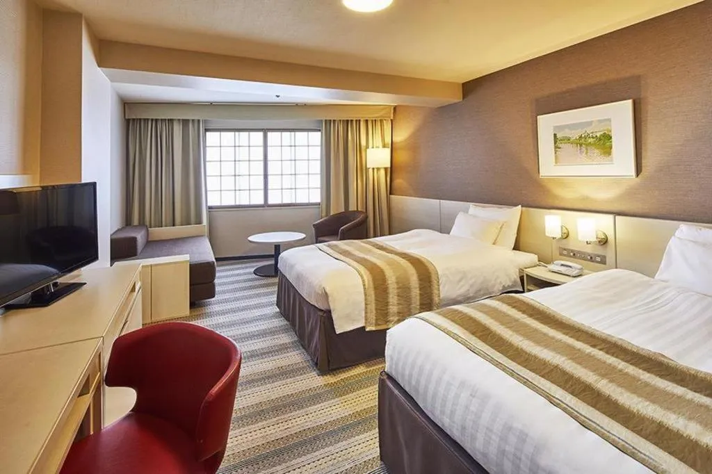 Bed in Akasaka Excel Hotel Tokyu