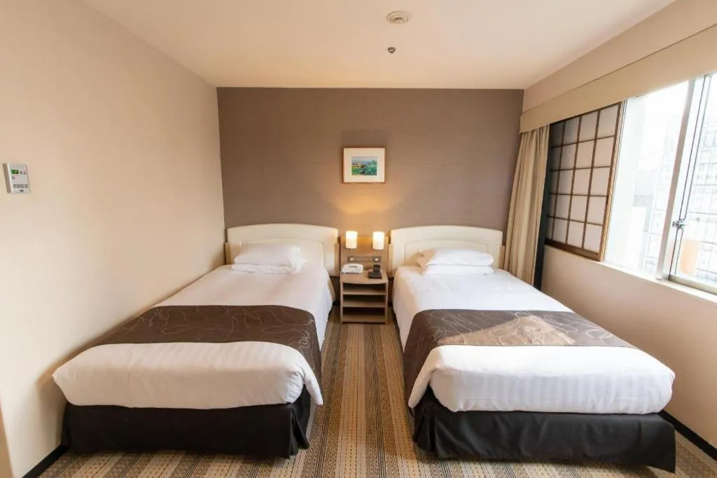 Bed in Akasaka Excel Hotel Tokyu