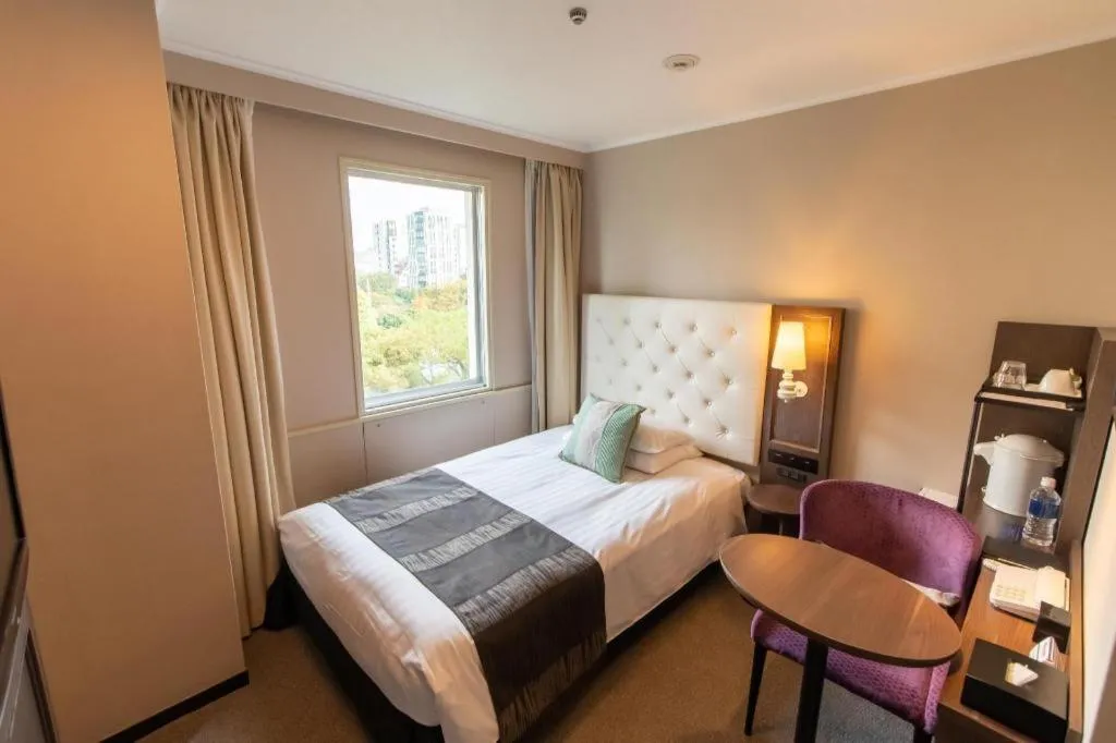 Bed in Akasaka Excel Hotel Tokyu