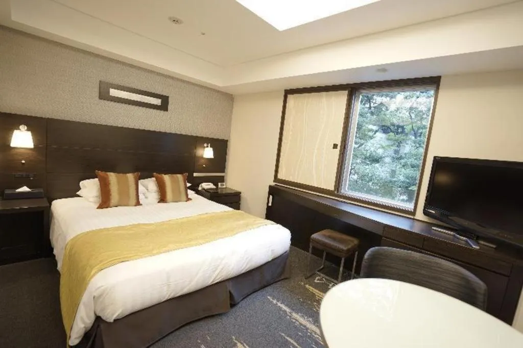 Bed in Akasaka Excel Hotel Tokyu