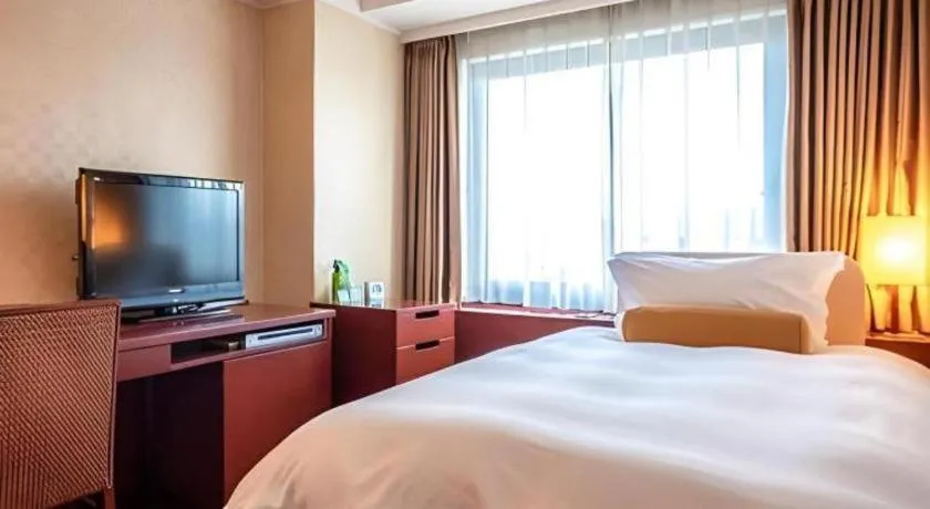 Bed in Miyazaki Kanko Hotel