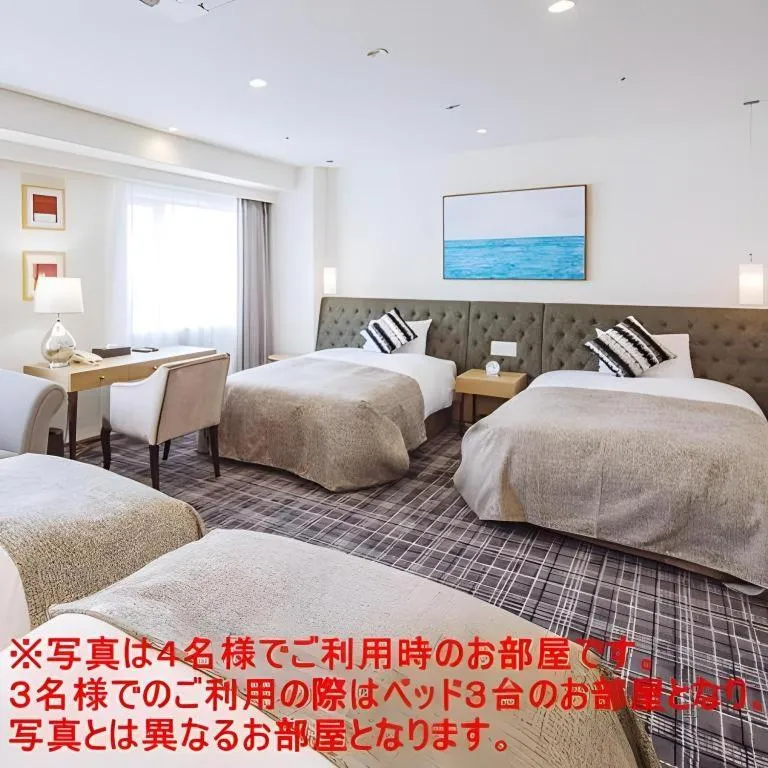 Bed in Miyazaki Kanko Hotel