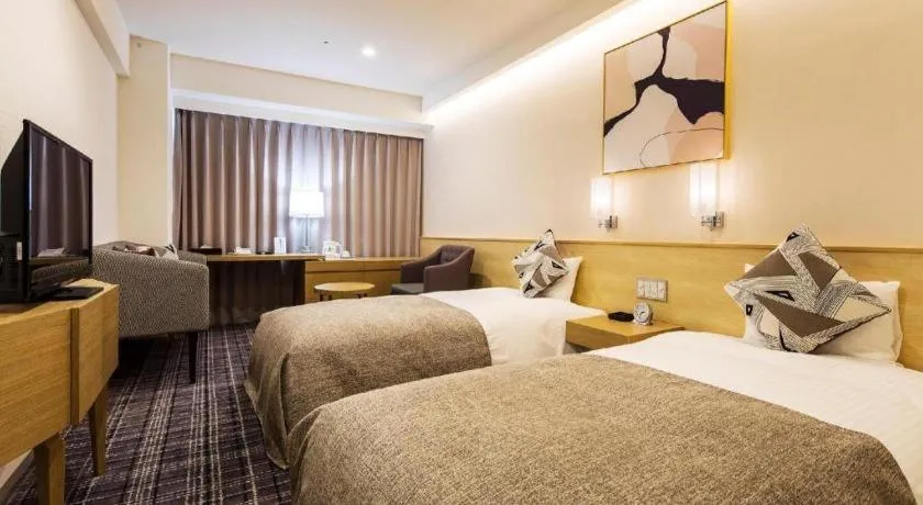 Bed in Miyazaki Kanko Hotel