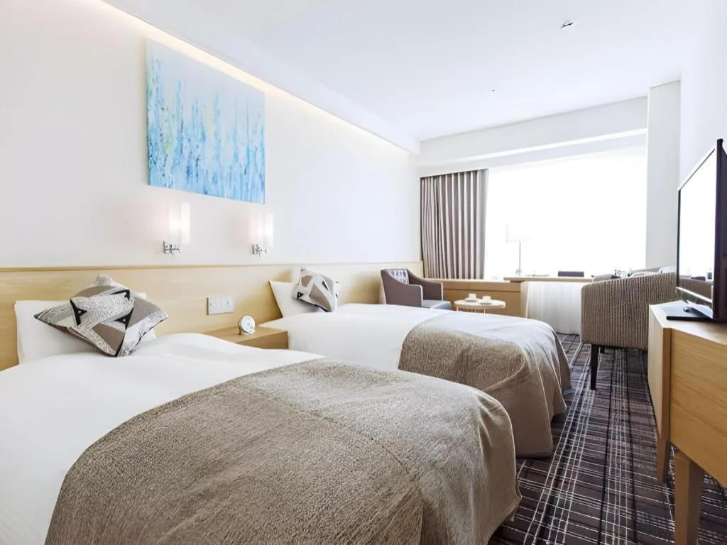 Bed in Miyazaki Kanko Hotel