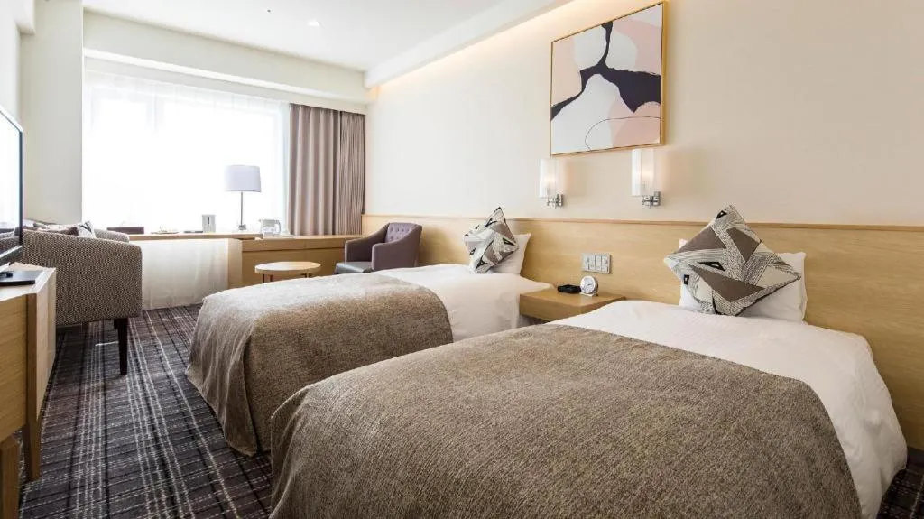 Bed in Miyazaki Kanko Hotel