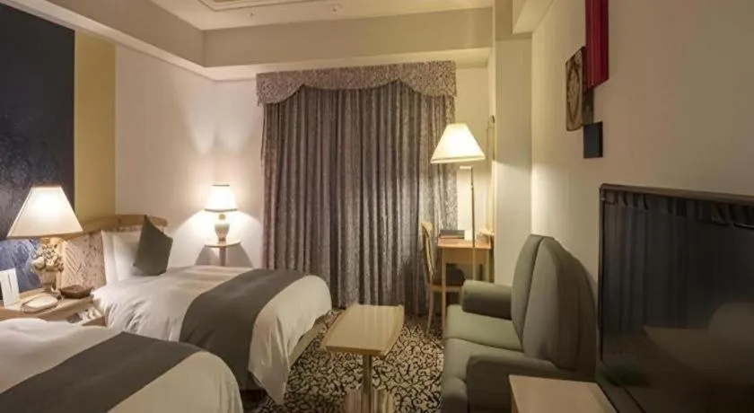 Bed in Miyazaki Kanko Hotel