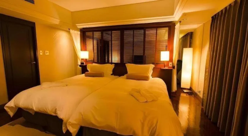 Bed in Miyazaki Kanko Hotel