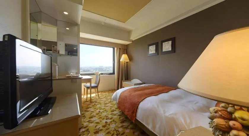 Bed in Miyazaki Kanko Hotel