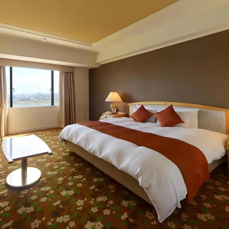 Bed in Miyazaki Kanko Hotel