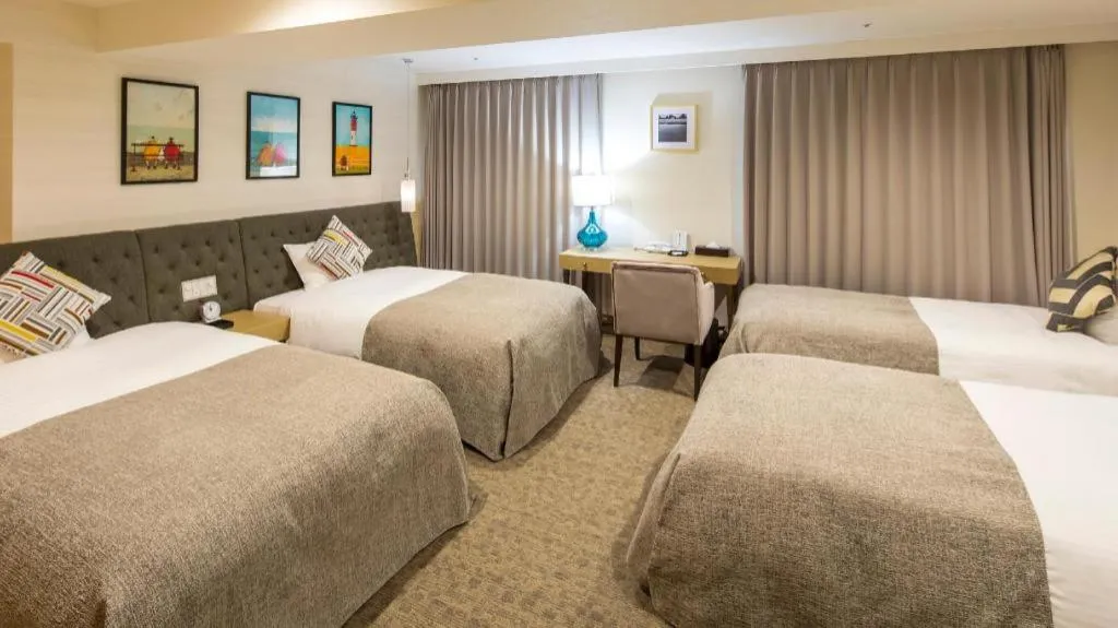 Bed in Miyazaki Kanko Hotel