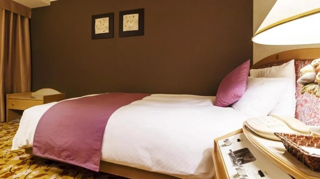 Bed in Miyazaki Kanko Hotel