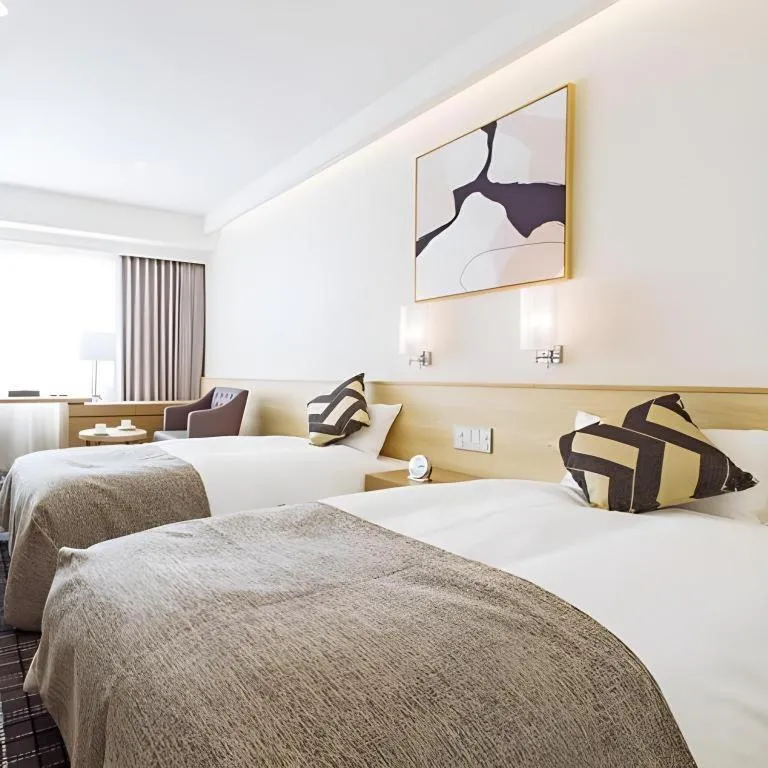 Bed in Miyazaki Kanko Hotel