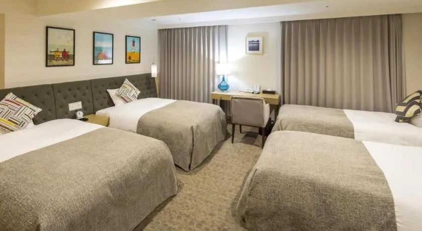 Bed in Miyazaki Kanko Hotel