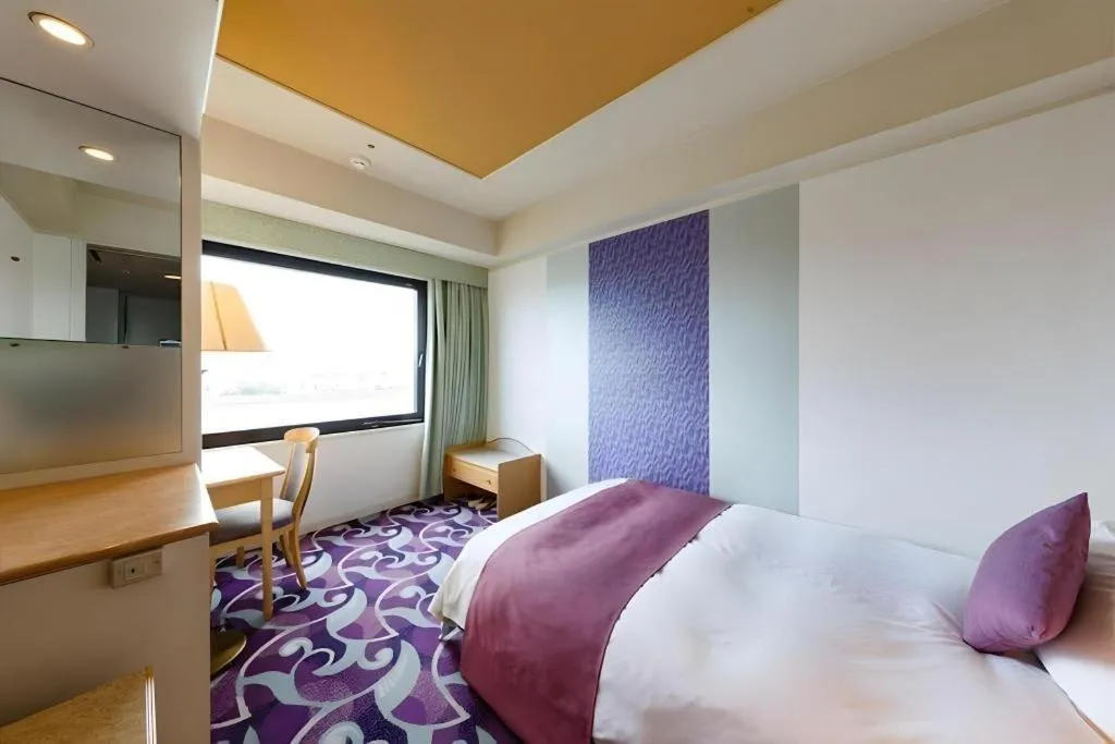 Bed in Miyazaki Kanko Hotel